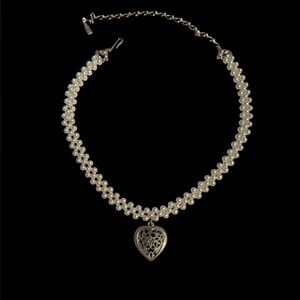 1928 faux pearl necklace with heart shaped enhancer.